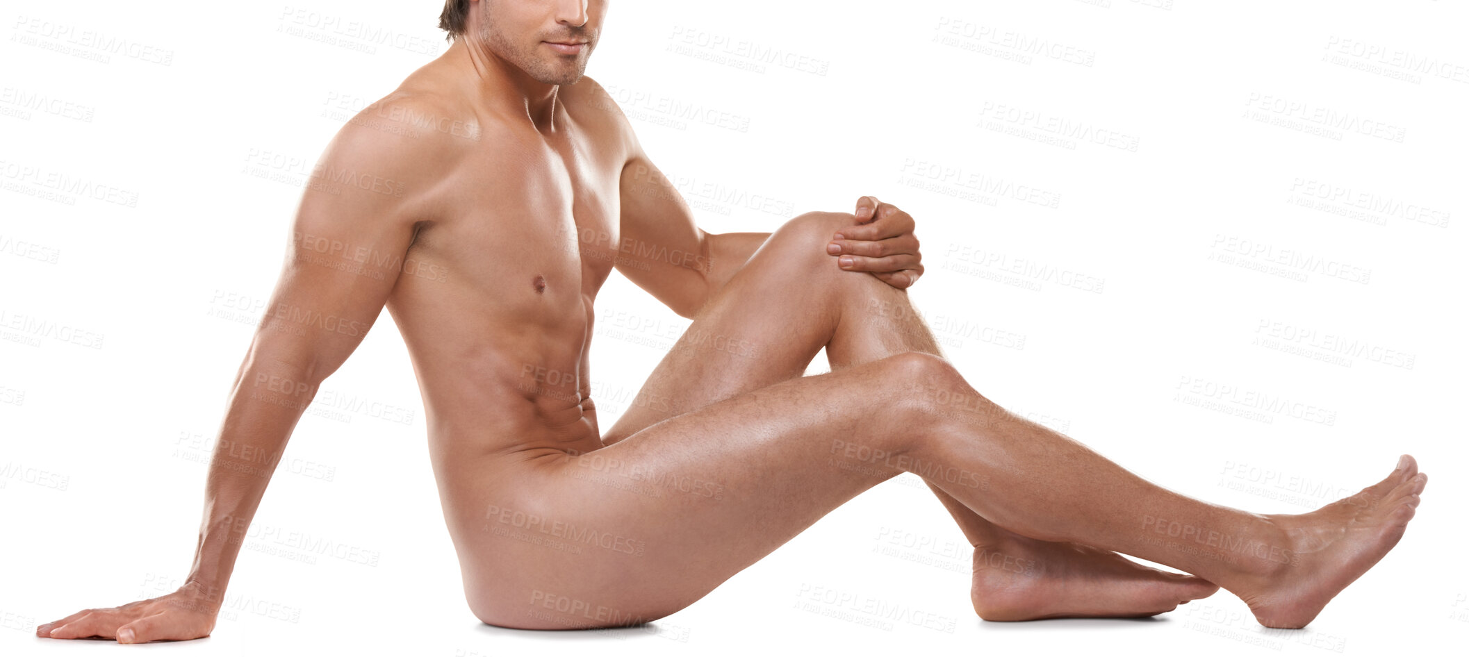 Buy stock photo Full length of a handsome naked man sitting against a white background