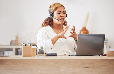 Buy stock photo Female call center agent talking on headset while doing a video or zoom call and working in an office. Businesswoman consulting and explaining while on a call for customer sales and service support