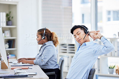 Stretching, stressed and tired call centre agent suffering from burnout, backache or being overworked. Lazy, bored and exhausted customer service representative feeling sleepy and listening to client