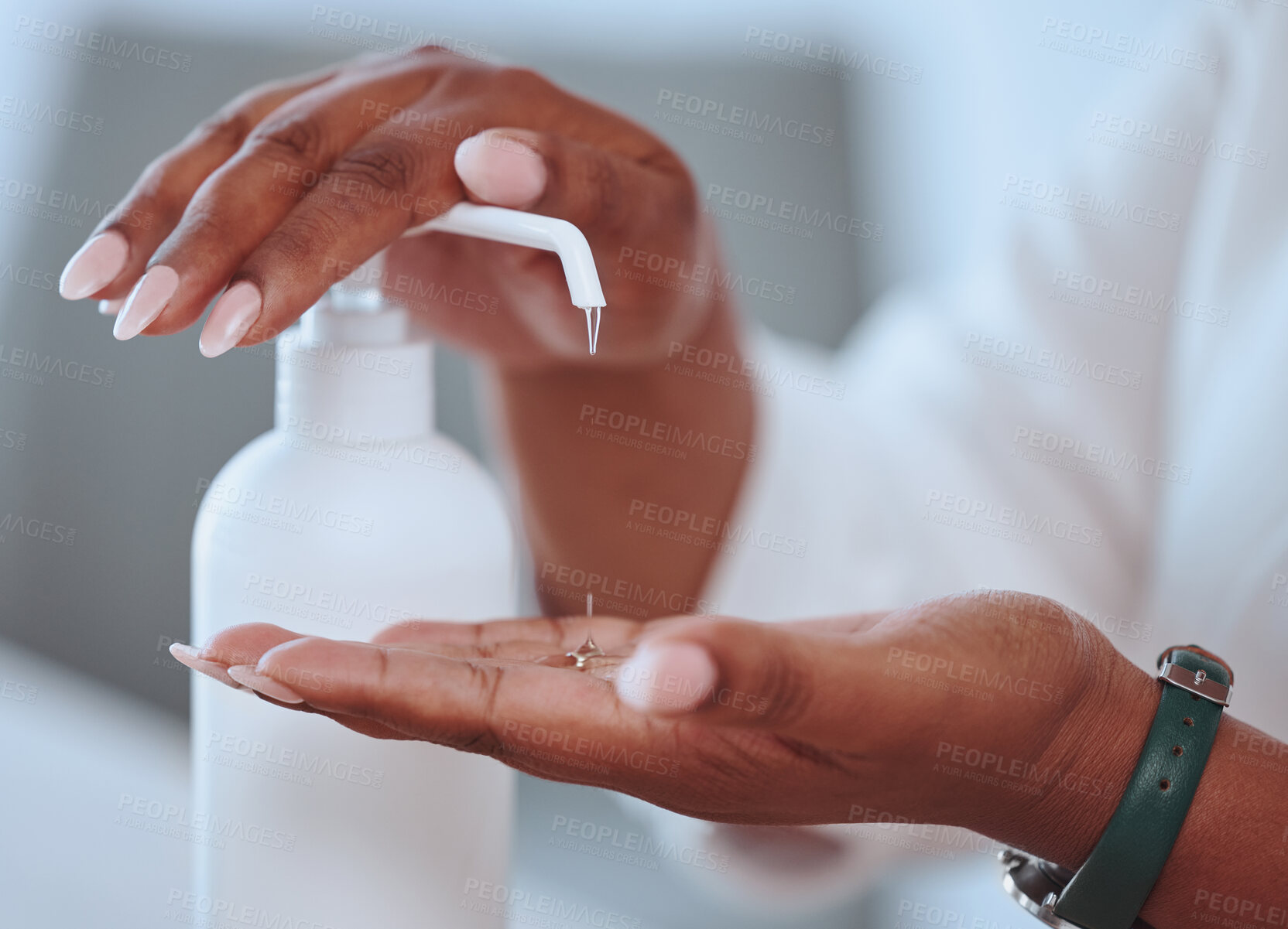 Buy stock photo Closeup of beautiful female hands washing using hand sanitizer with care. African American lady cleaning her skin for health and wellness reasons. A woman with pretty nails using hygiene soap.