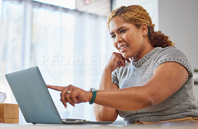 Modern business woman with a laptop showing online presentation to a global company. One young confident corporate professional reading email or doing social media and seo website analysis