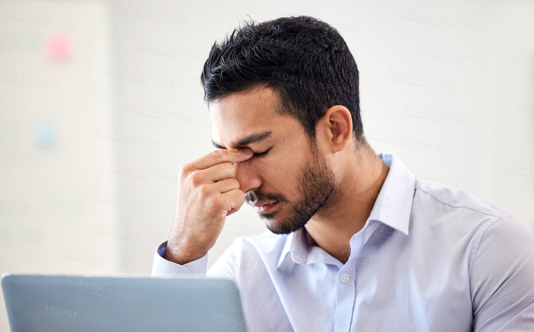 Buy stock photo Stressed, frustrated and depressed business man suffering from a headache or migraine and struggling to meet a deadline. Overworked, irritated and annoyed male worker experiencing problems and worry