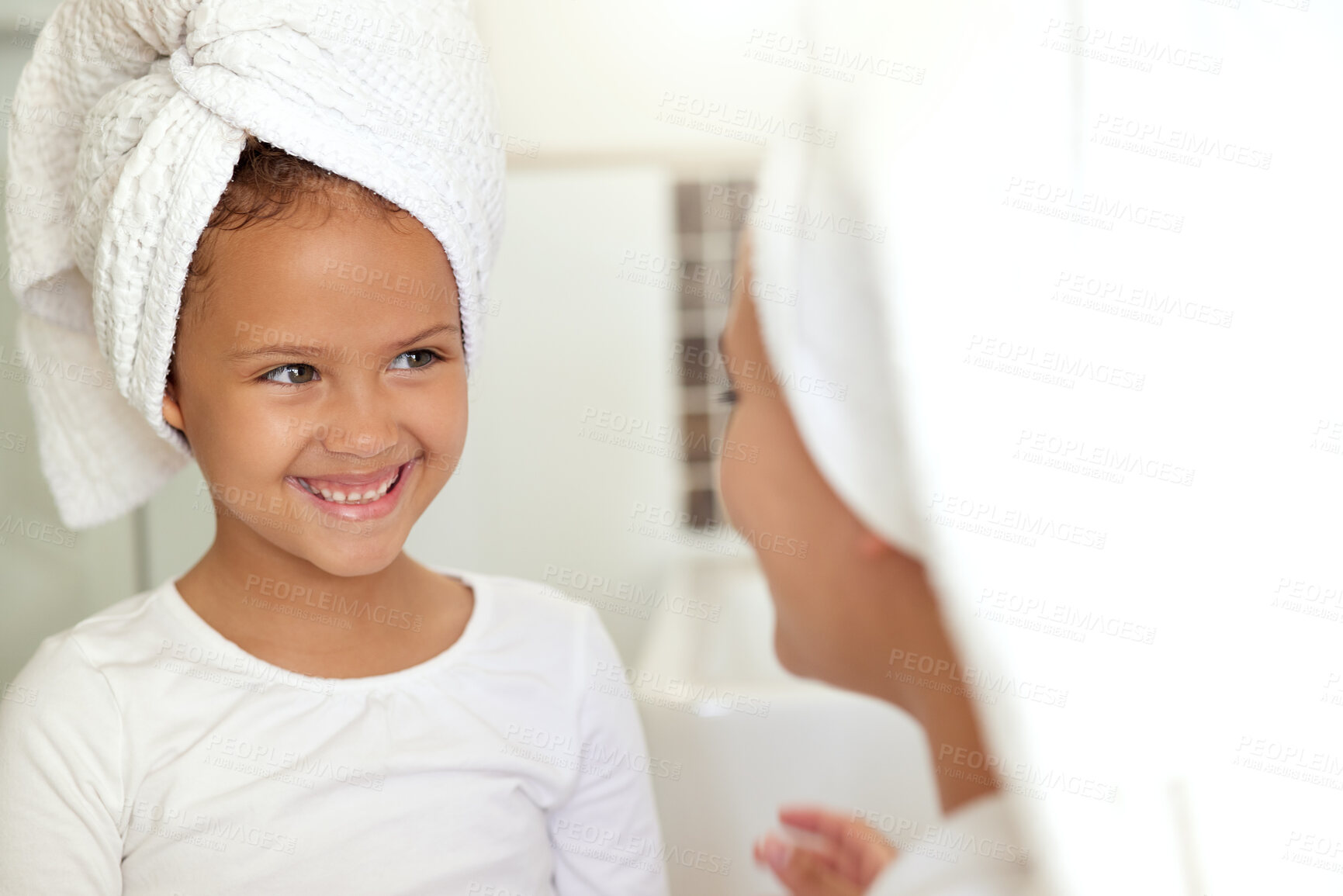 Buy stock photo Hygiene, washing hair and grooming with haircare routine in a mother and daughter home spa day. Happy, caring and sweet child and parent bonding over healthy skincare or relaxing pampering treatment