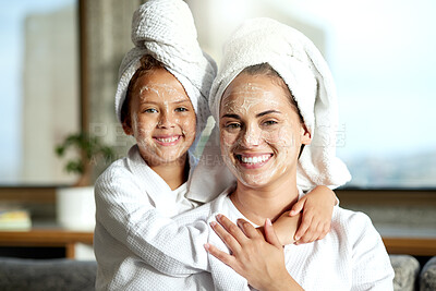 Buy stock photo Facial, beauty and skincare at a spa for a bonding mother and daughter. Portrait of a cheerful, loving and joyful little girl enjoying a relaxing pamper session together with her mom or single parent