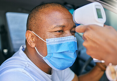 Buy stock photo Fever, temperature and Covid test at drive through station in a car. Screening patient with protective mask with a digital thermometer. Wellness and safety of people through a pandemic 