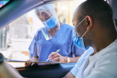 Buy stock photo Covid testing centre and drive thru service for patients with coronavirus or getting vaccine. African man in car wearing a protective face mask to avoid contact with medical worker asking questions