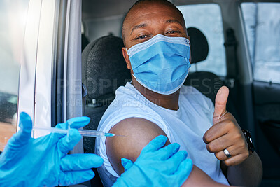 Buy stock photo Drive thru covid and corona virus vaccine site as a public service for the people. Man giving thumbs up and endorsing the jab while wearing a mask to avoid infection, approving being vaccinated