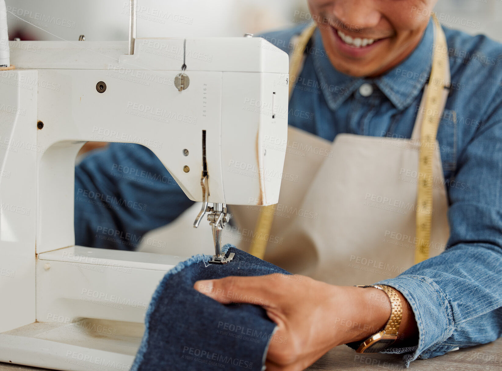 Buy stock photo Design student, creative and worker in a studio sewing clothes and garments. Fashion student learning sewing machine skills in a textile and manufacturing studio. Happy trainee practicing his craft