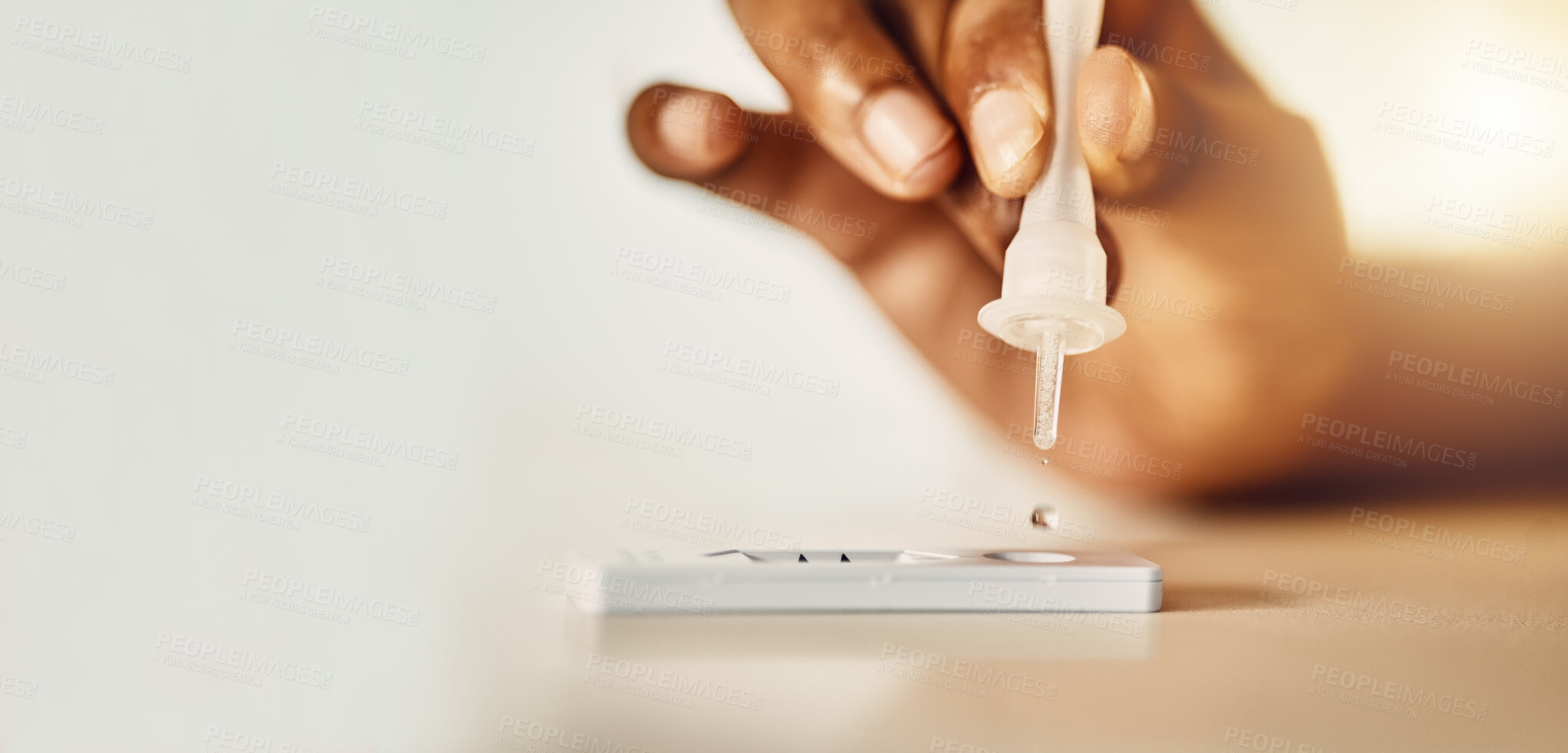 Buy stock photo Pandemic, corona and covid home rapid test for virus, disease and illness during lockdown inside. Closeup of hand using medical tools for an antigen test for covid results on a table inside