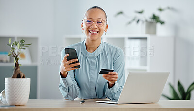 Businesswoman, finance advisor and executive shopping online with a phone and credit card in an office. Happy, smiling and cheerful trader banking with ecommerce internet payment while spending money