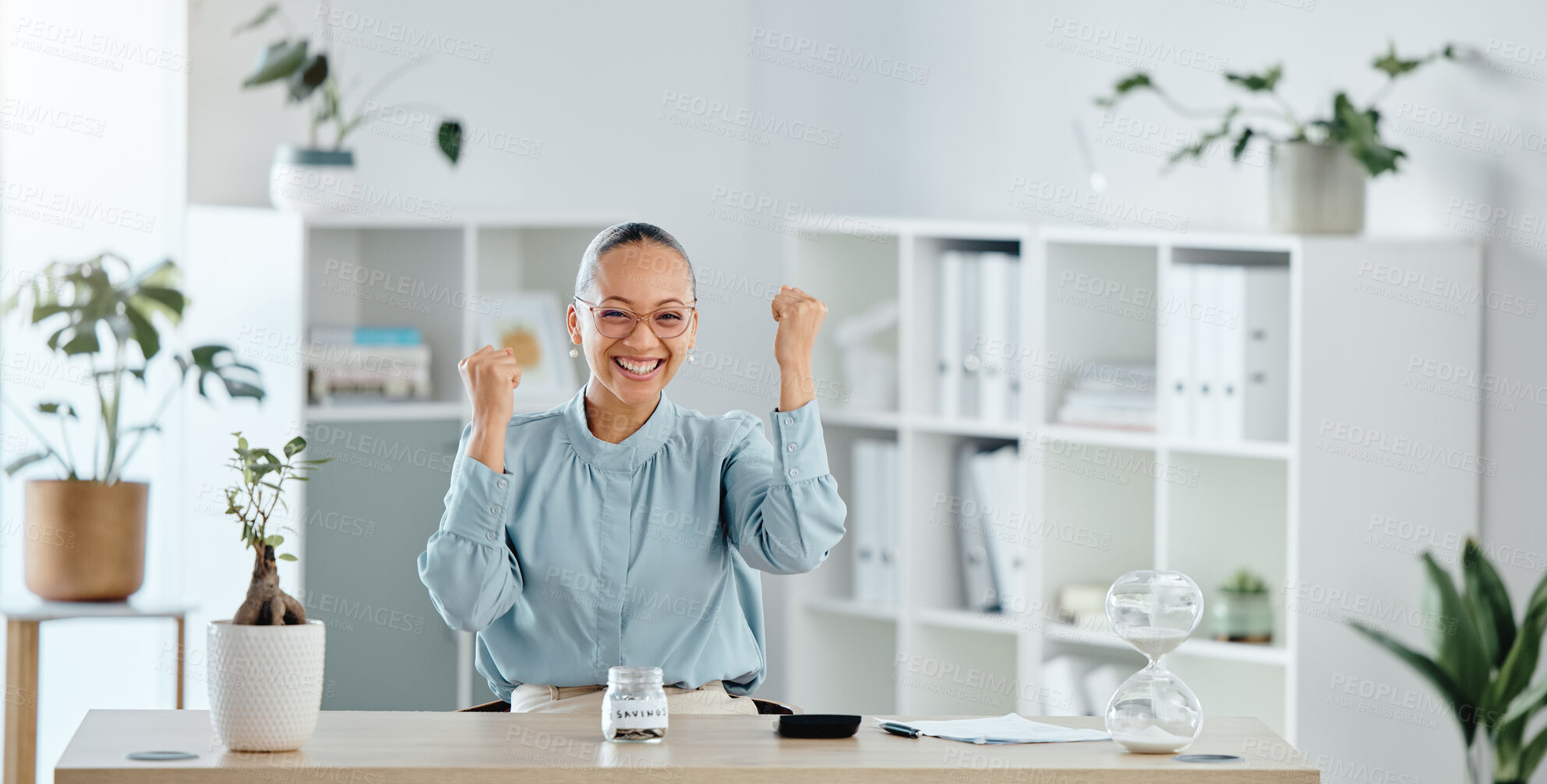 Buy stock photo Celebrating, happy and smiling accountant looking cheerful, joyful and excited after reaching savings target at work. Portrait of female professional cheering for success after achieving finance goal
