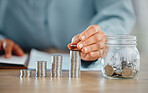 Hands holding coin pile to make a finance budget and successful financial choices. Closeup of money management and saving success. Stacked savings for the future, investment and retirement