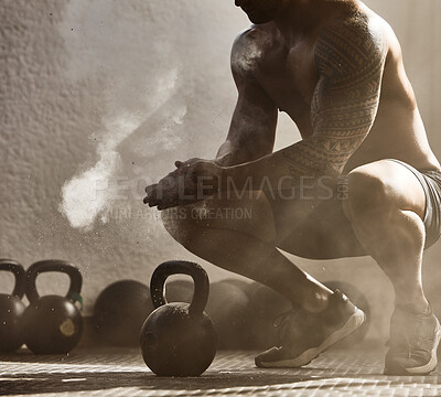 Fitness, workout of healthy wellness man at a gym. Big muscular male getting ready for weight lifting, preparing by clapping hands with powder dust. Fit, strong and athletic bodybuilder guy training.