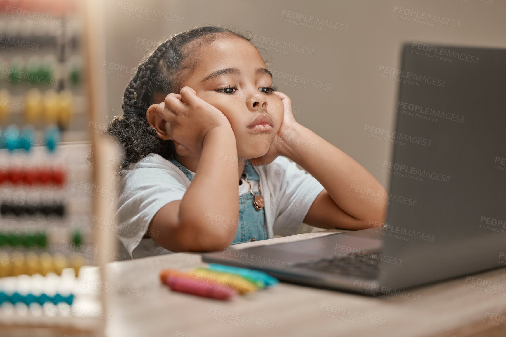 Buy stock photo Sad, education and child with laptop for school, studying online and listening on a video call class from home. Tired, adhd and bored girl with a computer for learning problem and e learning