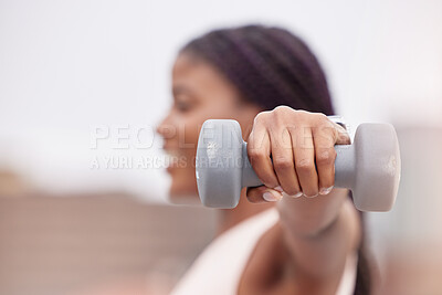 Buy stock photo Fitness, sports or black woman with dumbbell for strong arms, bicep muscles or powerful shoulders in training. Outdoors, blurry or African girl hands weightlifting in a workout or exercise in Nigeria