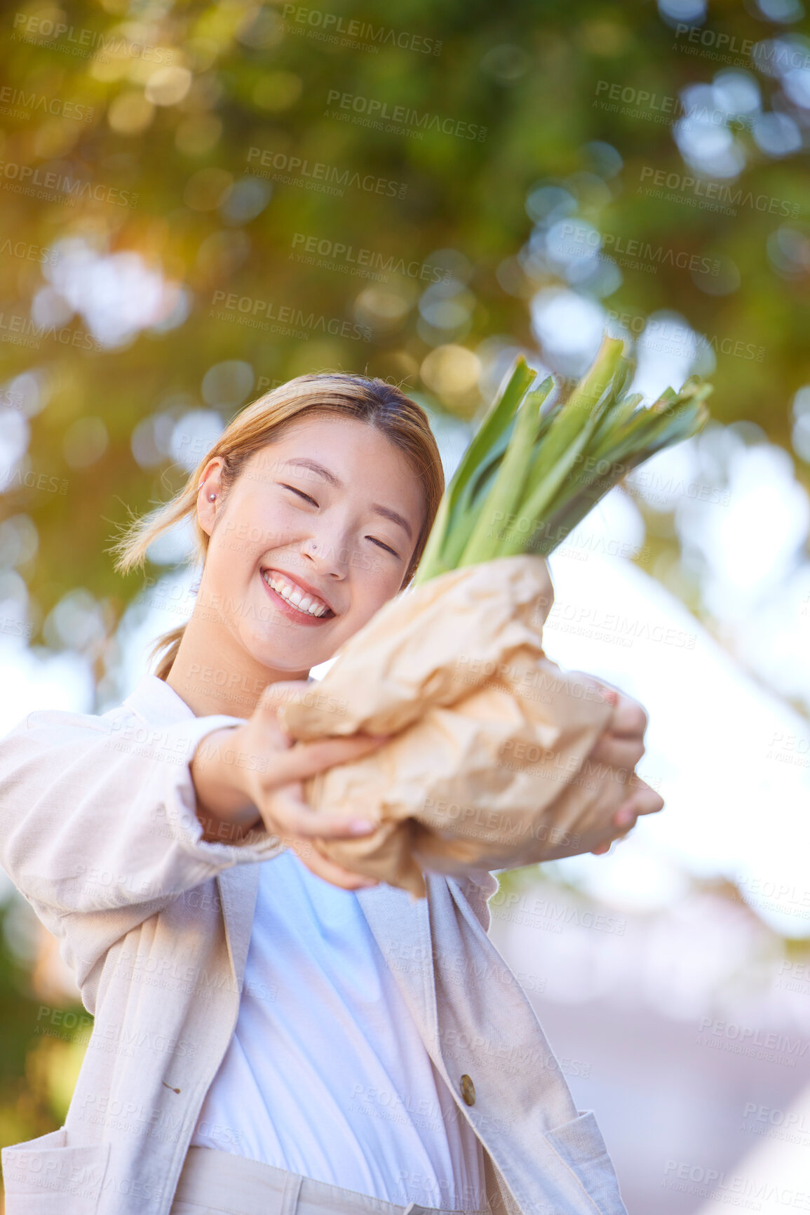 Buy stock photo Grocery, shopping bag and Asian woman with vegetables in city after buying healthy or nutritious plants at market. Wellness, sales deals and female vegan with products after purchase at supermarket.