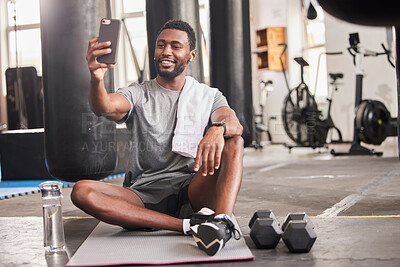Buy stock photo Selfie, black man and gym for exercise, training and workout for social media, connectivity and relax. African American male, athlete and smartphone to share pictures, fitness and wellness with smile