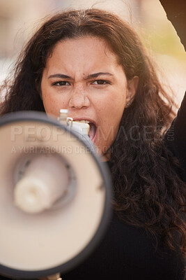 Buy stock photo Woman, megaphone and protest in the city for human rights, gender based violence or equality in the outdoors. Female activist shouting, screaming and speaker for discrimination, community or change