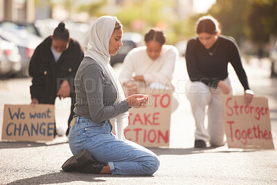 Buy stock photo Protest, Islamic woman and pray in street, group and support for Palestine. Muslim female, girl or protesters with cardboard signs, fight for justice or change in society for oppression or solidarity