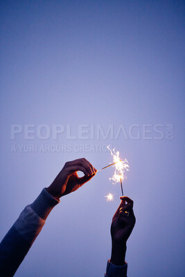 Buy stock photo Sparkler, fire and hands of a person on a blue sky, celebration with light and outdoor party at night. Creative, color and woman with fireworks to celebrate in nature during sunset at new years