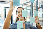 Agenda, writing or woman with sticky notes for goals, our vision or mission for a startup company in an office building. Smile, creative or happy employee planning ideas or a productivity schedule