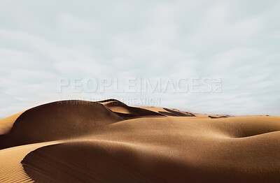 Buy stock photo Sand, dessert and nature background in summer looking sexy like the beauty and body of a nude woman lying naked. Blue sky copy space above dry, arid and sandy terrain in the outdoor environment