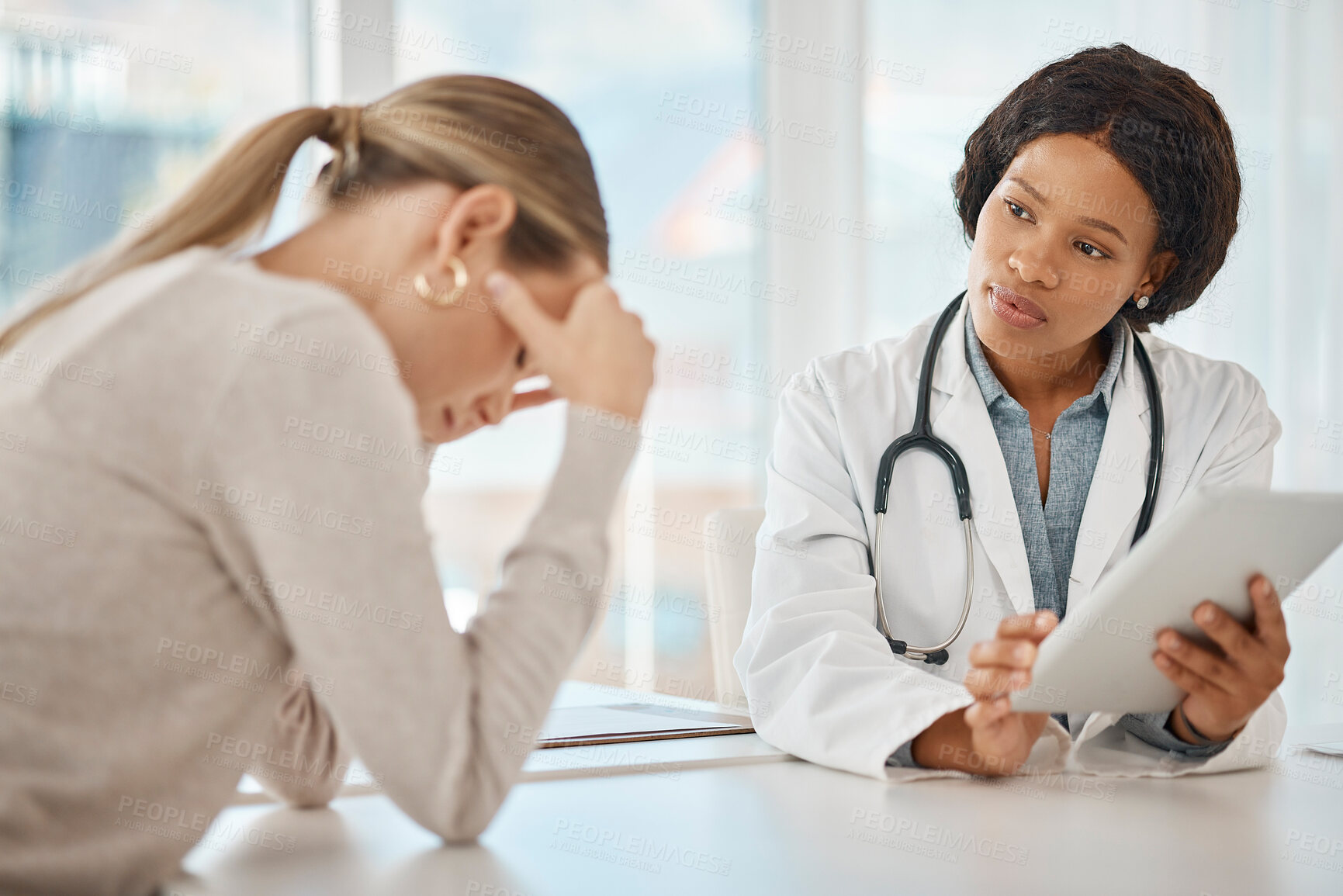 Buy stock photo Supporting, consoling and comforting a patient with a doctor consulting a woman in the hospital during a medical appointment. Discussing negative test results during medicine and healthcare check up