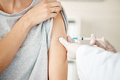 Buy stock photo Vaccine, injection and virus cure for covid, disease and pandemic illness from doctor, healthcare or medical professional. Closeup hands, arm and needle or syringe being injected into female patient