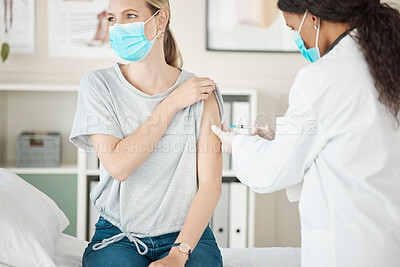 Buy stock photo Covid vaccine at hospital, sick woman wearing face mask to prevent risk of virus and medical doctor giving injection during checkup at clinic. Female gp doing health test and protecting from disease