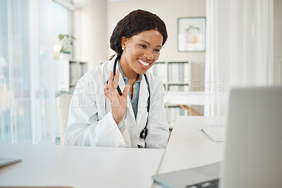 Buy stock photo Video call, virtual medical meeting with a doctor waving, greeting and smiling with a laptop online working at a hospital. Professional healthcare worker doing telemedicine and giving advice