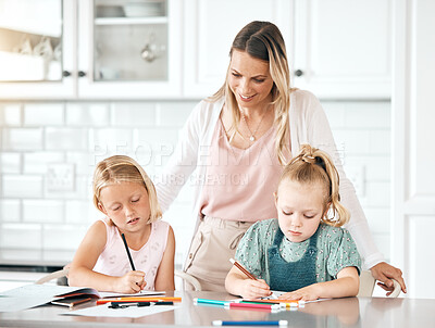 Buy stock photo Education, learning and homework with a girl, her sister and their mom in the kitchen at home. Single mother helping, assisting and teaching her daughter with school, studying and coloring or drawing
