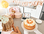 Birthday party during covid, video call and celebration with friends and family on Zoom. Girl having a internet, cyber or virtual social distancing gathering with cake and presents during pandemic