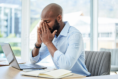 Buy stock photo Stress, anxiety and worry with a business man suffering from a headache, migraine or mental fatigue and burnout. Young male working in his office, feeling the pressure of a deadline and struggling