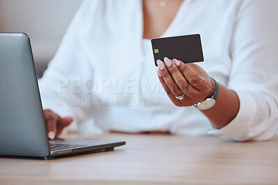 Buy stock photo Credit card, laptop and finance with a businesswoman paying her bills and mortgage online. Black woman ordering, hands and banking as she saves money in her bank account for a budget or loan.

