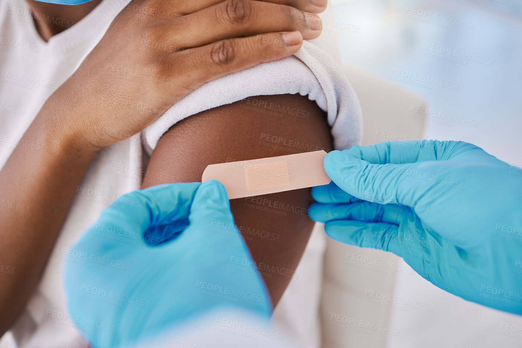 Buy stock photo Plaster bandage on arm for covid vaccine, injection and cure given to patient by a doctor in a hospital. Closeup of flu jab, antiviral shot and health treatment to boost immunity and prevent illness