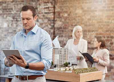 Buy stock photo Serious professional architect design engineer working on digital tablet for building plans in modern office at architecture company. Creative interior designer thinking on new development project