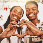 Heart hands, emoji and love of happy, smile and young couple showing kindness, trust and support. Closeup of black people together in romantic relationship celebrate honeymoon with with content bond
