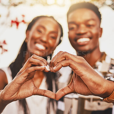 Buy stock photo Heart hands, emoji and love of couple smile, happy and showing kindness, trust and support. Closeup of young black people together in romantic relationship celebrate honeymoon with with content bond