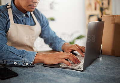 Buy stock photo Fashion designer typing on laptop, browsing online order and searching trendy, fashionable and stylish clothes inspiration. Closeup tailor or seamstress hands with tech in workshop, boutique or store