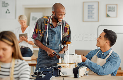 Buy stock photo Fashion designers, colleagues and men sewing clothes in a workshop. Happy, diverse and smiling young creatives planning garment designs in a textile, clothing and manufacturing studio or factory