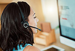 Call centre, customer service and agent with a computer talking to customers, helping or answering calls in office. Closeup headshot of smiling, happy and friendly helpdesk operator and receptionist