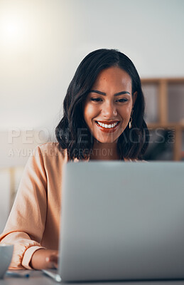 Buy stock photo African woman working on laptop, networking on social media online and browsing internet while sitting in an office alone at work. Smiling and cheerful female manager planning and creating a strategy