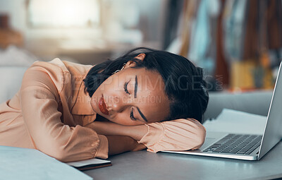 Buy stock photo Tired woman suffering from burnout at work, sleeping at desk and napping after meeting a deadline in an office alone. Business woman and corporate professional resting, taking a break with laptop