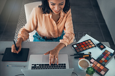 Buy stock photo Graphic designer designing marketing advert for beauty products, makeup and cosmetics on laptop from above. Top view of smiling entrepreneur or freelance worker checking creative work