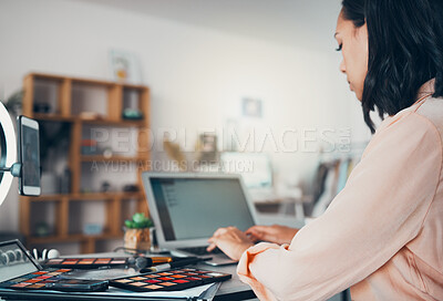 Buy stock photo Beauty blogger, freelancer and entrepreneur working on laptop, writing notes, product reviews and makeup brand marketing while working from home. Busy female influencer checking emails and networking