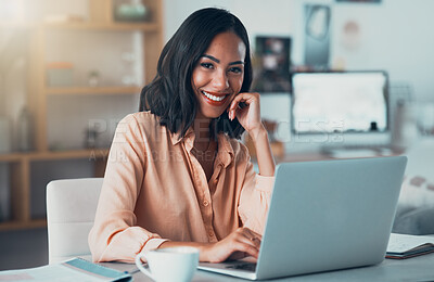 Buy stock photo Entrepreneur, small business owner or startup employee feeling motivated by the mission and vision of her company. Portrait of a happy business woman working on her laptop at a desk in the office
