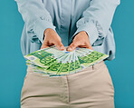 Money, investment and finance success of a businesswoman hands with cash, bank notes or wealth. Closeup showing person making large payment, spending her savings, financial growth or business profit