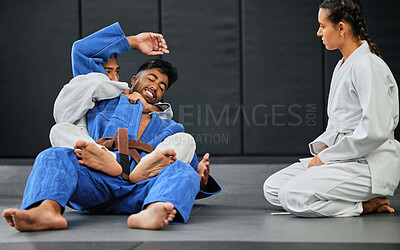 Buy stock photo Karate, fitness and martial arts students learning sport, training and discipline from their coach at workout, exercise or gym club. Sports, healthy and team in fighting practice from an instructor