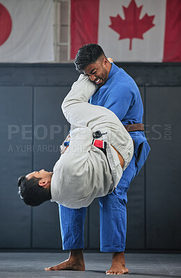 Buy stock photo Mma, training and fighting with a student and teacher exercising during a self defense workout in a gym or fight studio. Combat sport with a fighter and his opponent in gi or uniform in a match