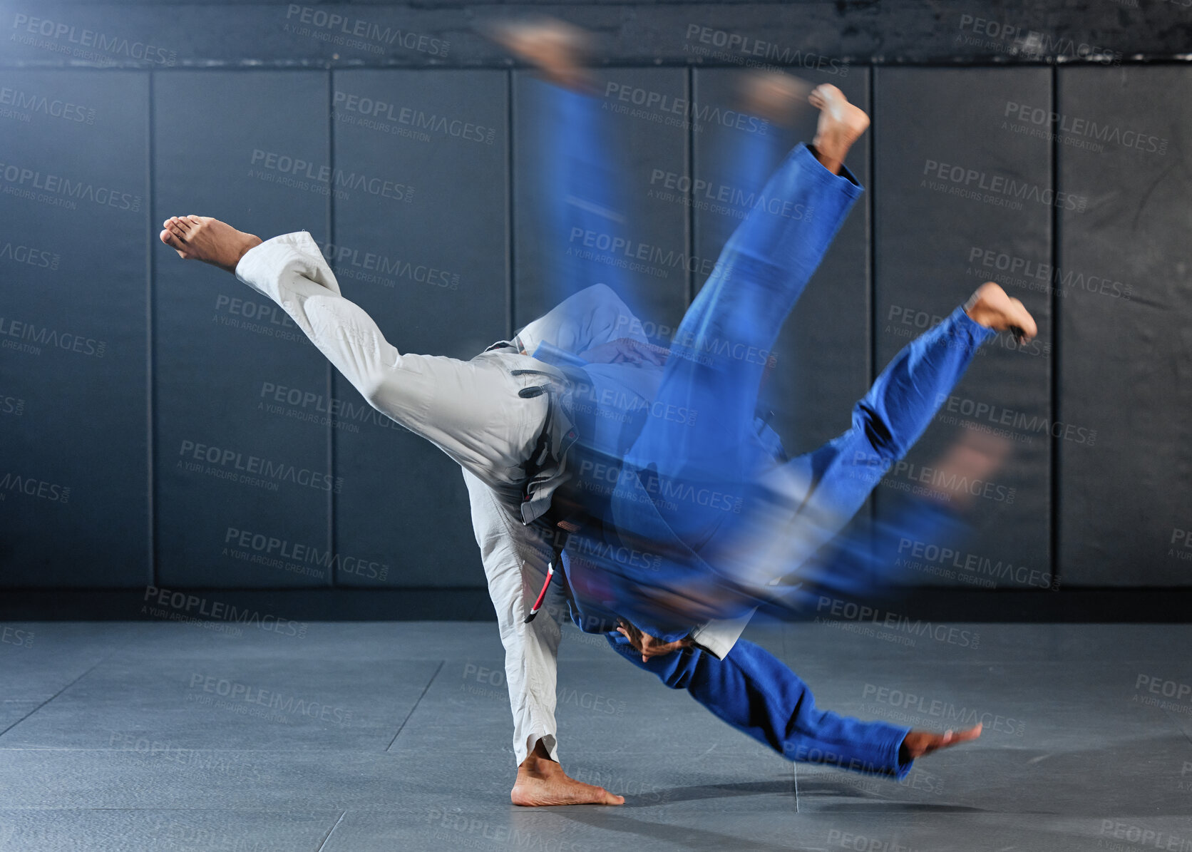 Buy stock photo Fitness, strength and men in a karate fight in a gym for martial arts exercise. Action, motion and learning to take down the competition, training to overcome, fight failure and the motivation to win